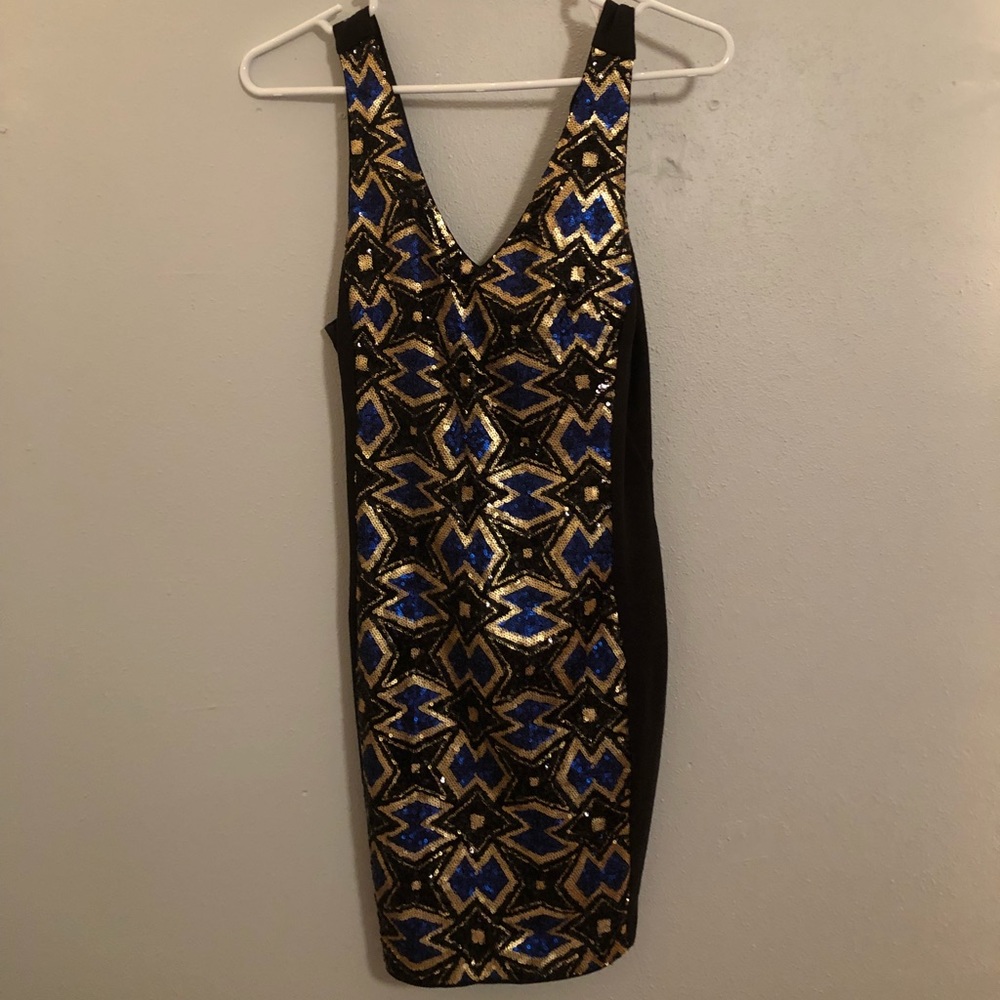 Black dress with gold and blue sparkle pattern